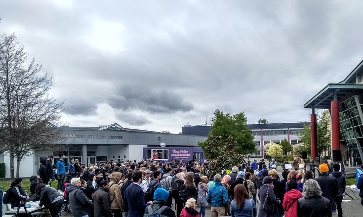 crowd of protesters in front of south seattle college