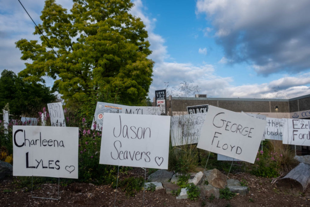 The tombstones on 23rd and Yesler for those killed by police in recent years continue around the corner